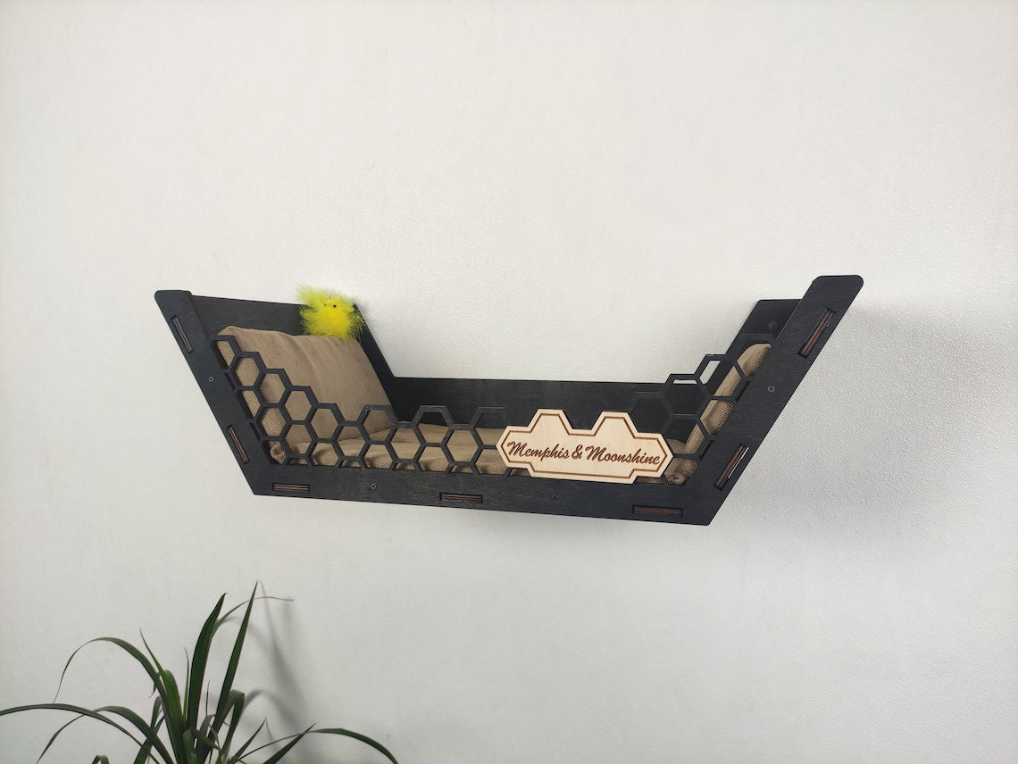 Modern cat shelf with integrated storage for toys and treats